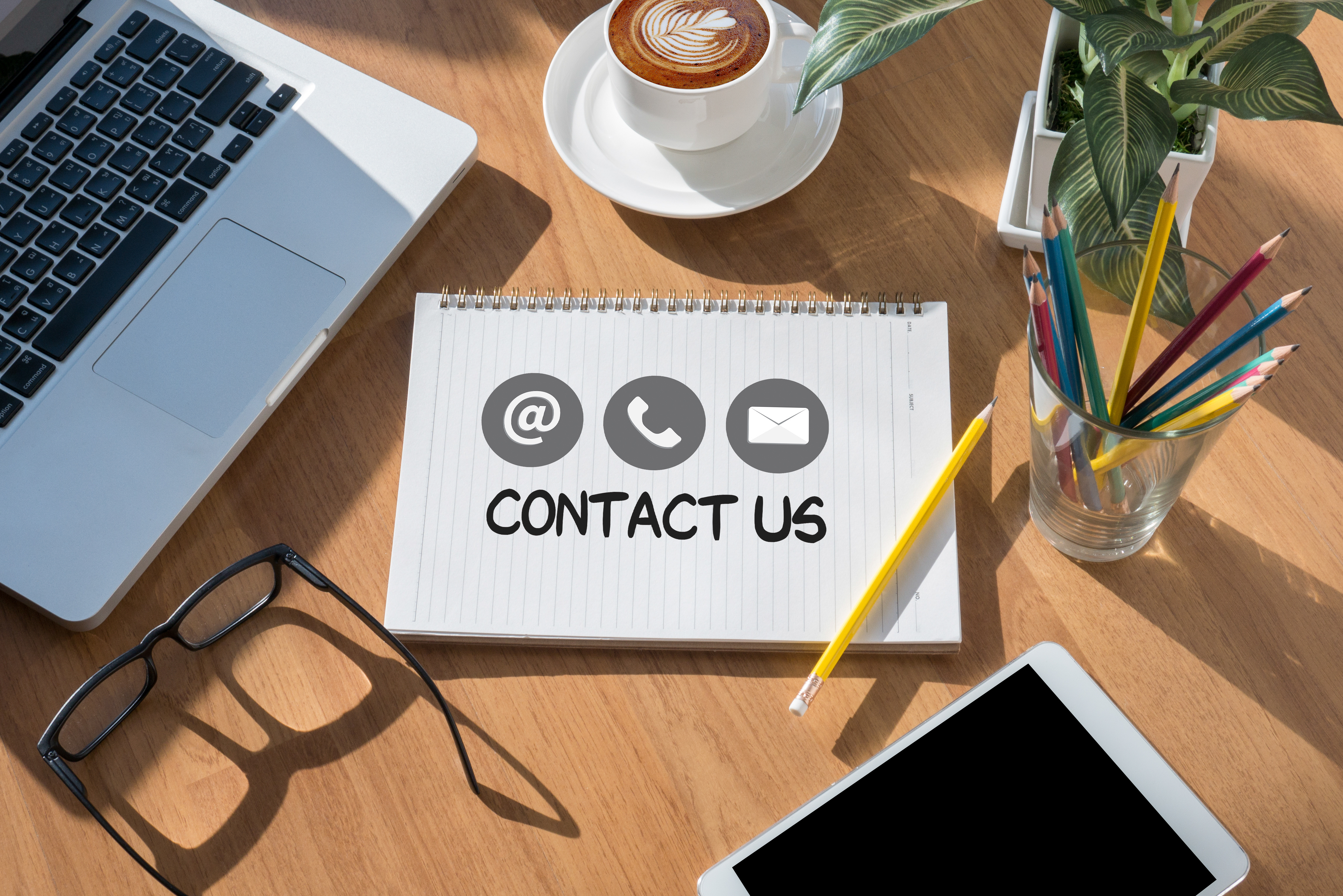 CONTACT US (Customer Support Hotline people CONNECT ) open book on table and coffee Business